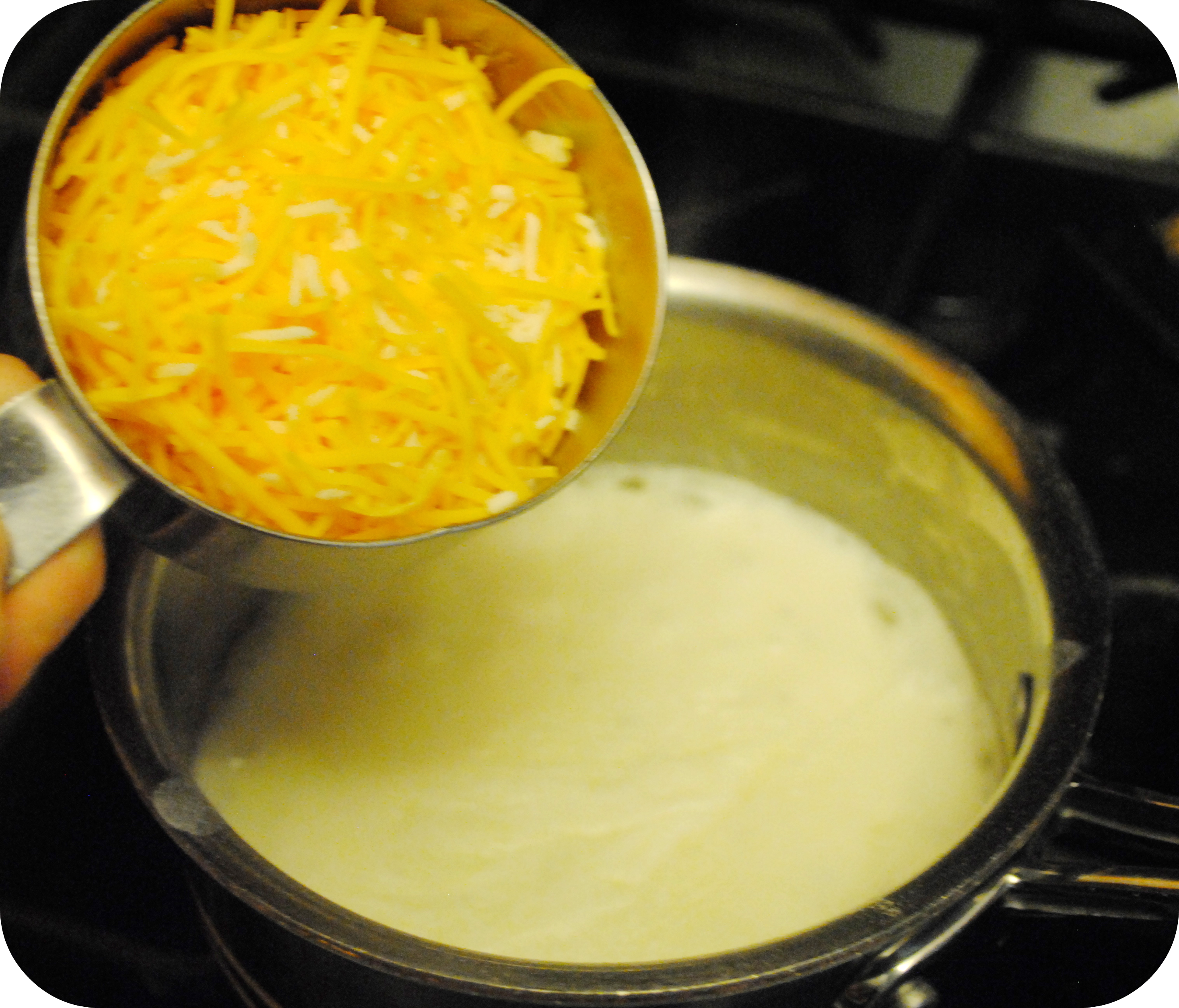 adding cheddar cheese